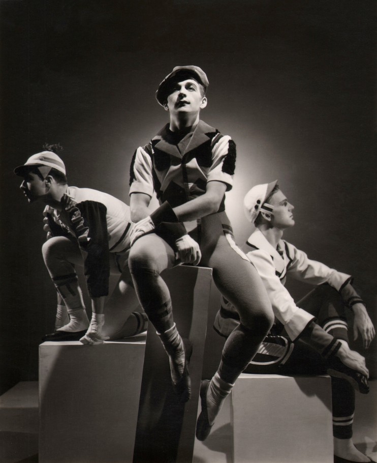 George Platt Lynes, Show Piece, The Ballet Caravan, ​1937. Three male figures pose seated on blocks facing left, forward, and right.