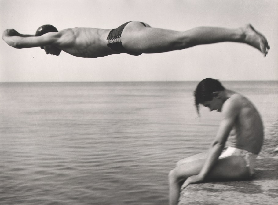 Nino Migliori, The Diver, 1951. One man jumps over another into the ocean.