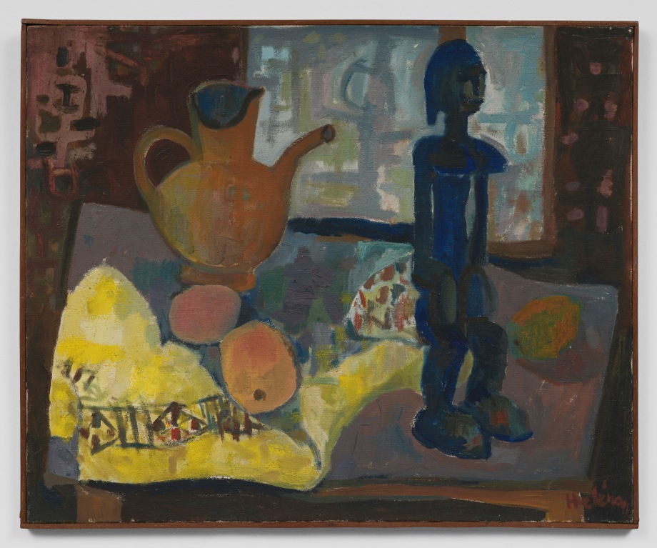Still life of a table with fruit, an African statue and a pot