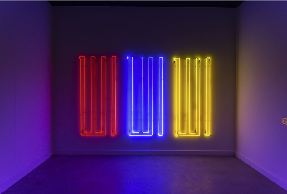 Red, Blue and Yellow neon - says &quot;allah&quot; three times