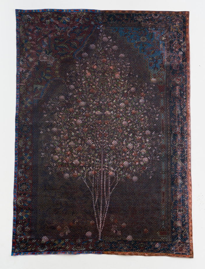 Woven paper artwork reminiscent of an oriental rug - center is a large tree