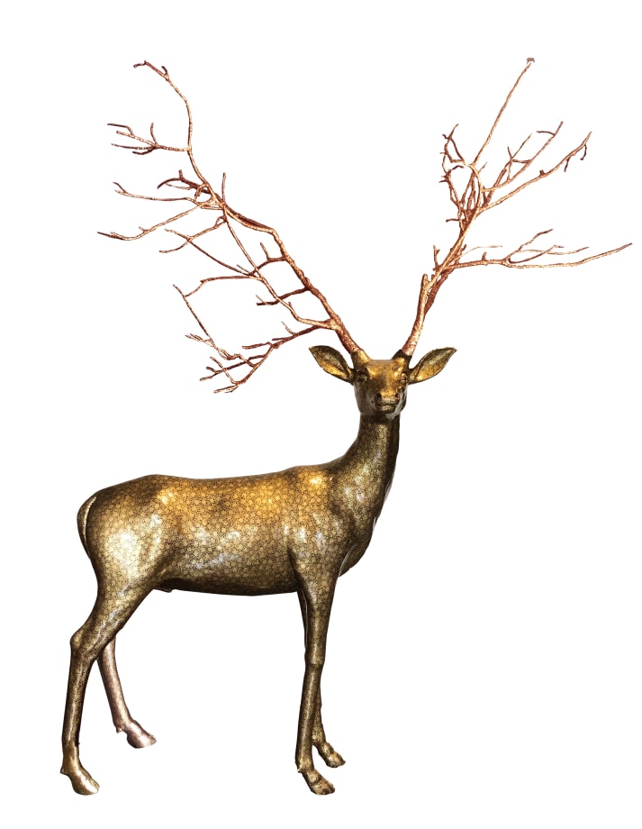 gold deer sculpture