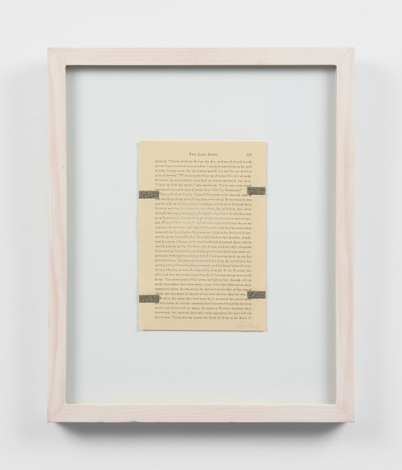 book pages with individual letters cut out and rearranged