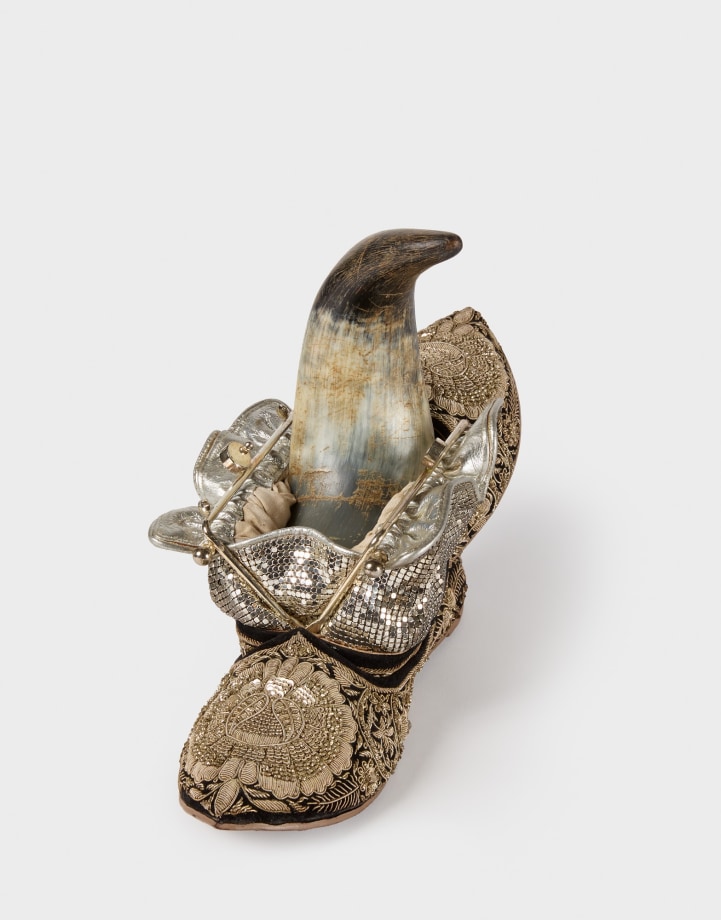 Anindita Dutta, Sex, Sexuality, and Society - GUYANA, 2023,&nbsp;Used shoes, used clutch bag, and animal horn, 9 1/2 x 6 15 in (24.1 x 15.2 x 38.1 cm)