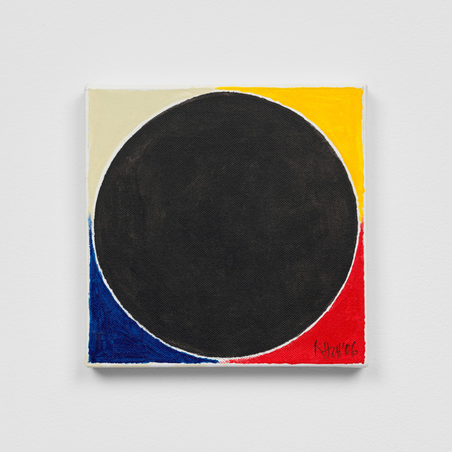 Abstract painting with black circle and primary colors