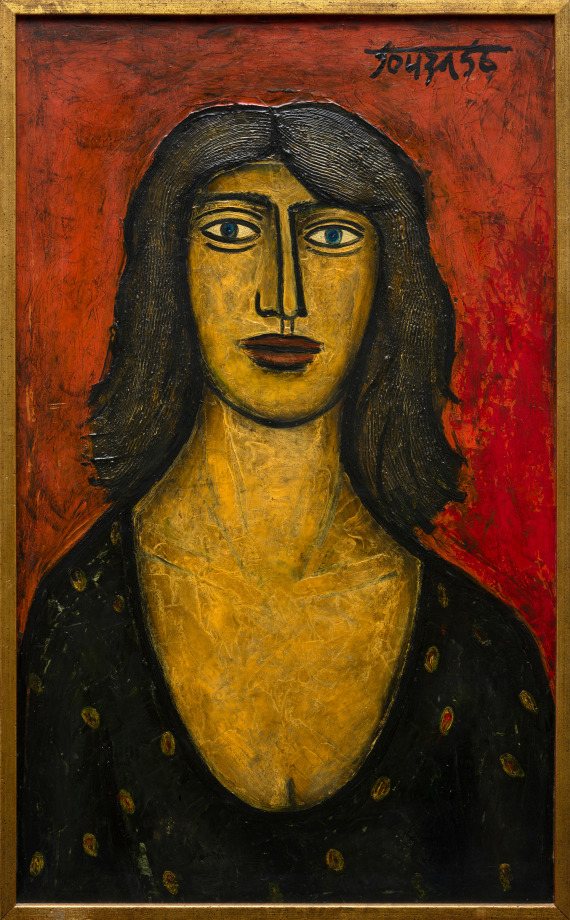 Portrait of a woman with a black top on bright orange background