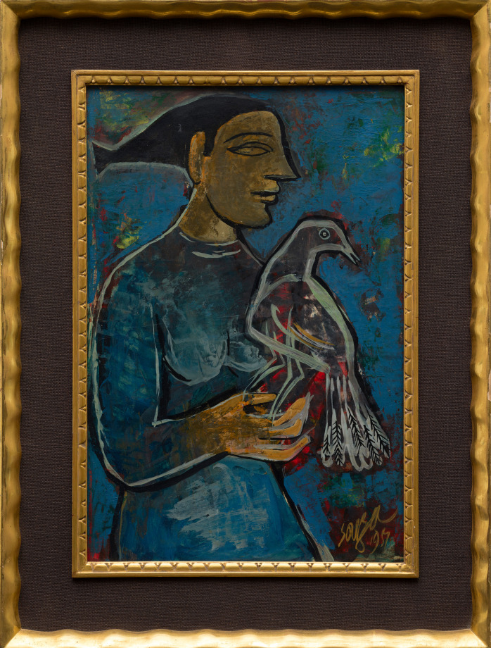 Woman holding bird on a dark blue background