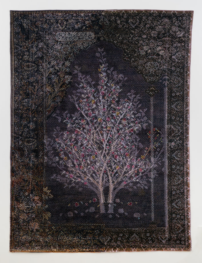Woven paper artwork reminiscent of an oriental rug - center is a large tree