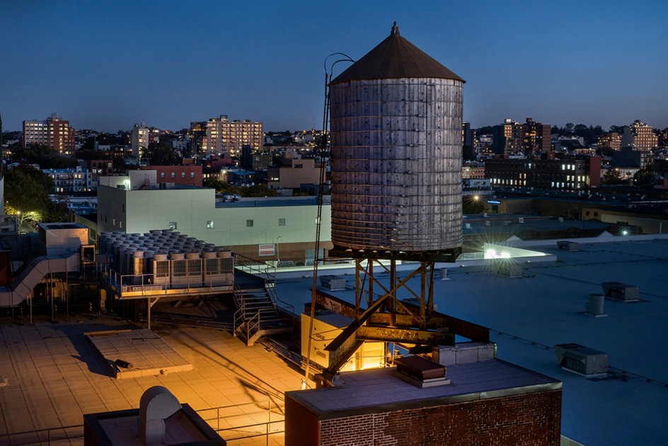 Lynn Saville,&nbsp;Water Tower from Smith and Ninth Street, 2020. Archival pigment print, 36 1/3 x 53 inches.