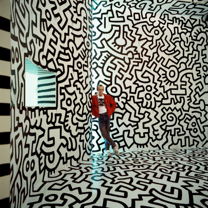 Tseng Kwong Chi,&nbsp;Keith Haring, New York Pop Shop,&nbsp;1986. Chromogenic print, 19 1/2 x 19 1/2 inches.