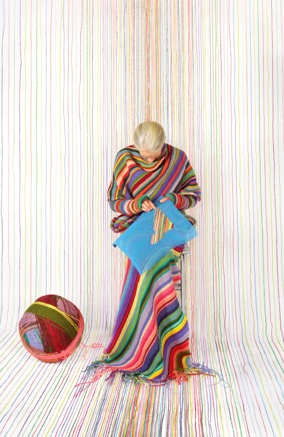 Rachel Perry, Lost in My Life (Needlepoint Sitting Stitching), 2023. Archival pigment print, 30 x 19 1/2 inches.