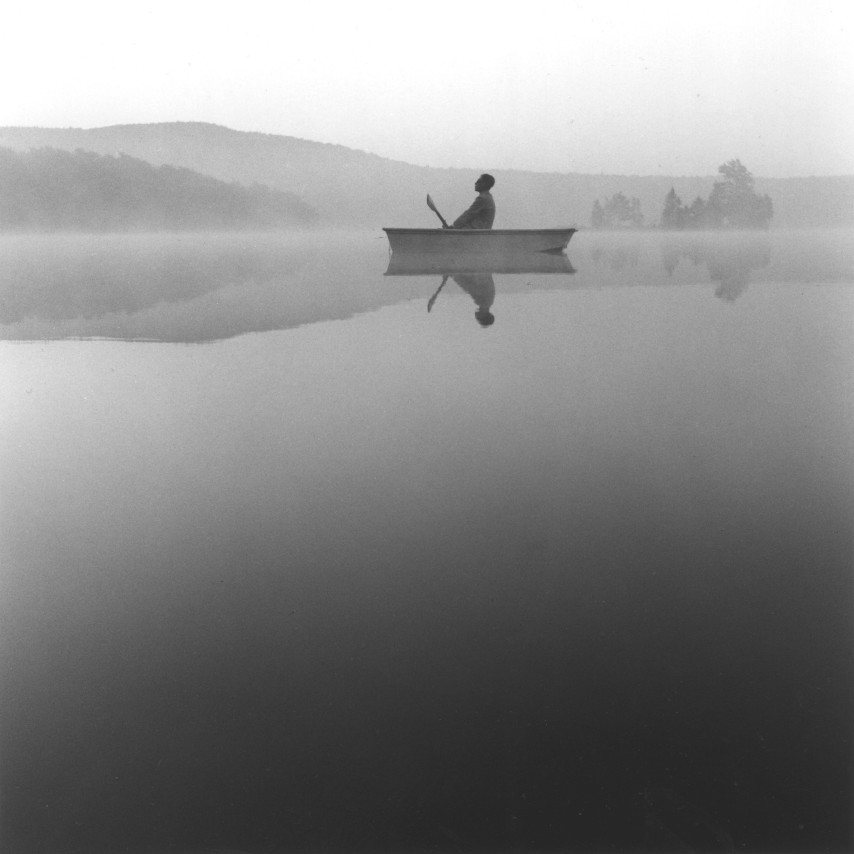 Tseng Kwong Chi,&nbsp;Lake Ninevah, Vermont,&nbsp;1985.&nbsp;Gelatin silver print, 16 x 16 inches.