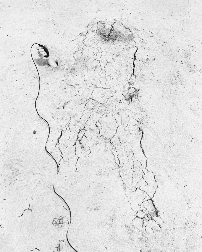 Jenny Calivas, Self-Portrait While Buried #5, 2021.&nbsp;Gelatin silver print, 50 x 40 inches.