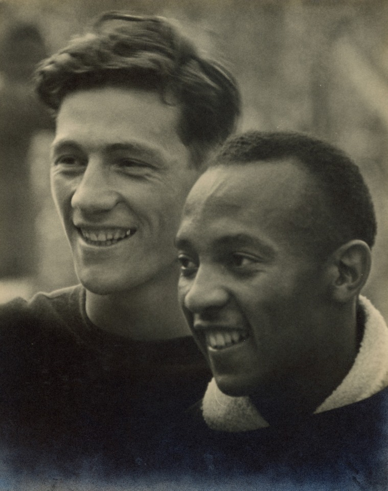 12. Leni Riefenstahl (German, 1902-2003), 13 - Jesse Owens - USA (Athletes as spectators), 1936, Vintage Gelatin Silver Print, 11&rdquo; x 9&rdquo;