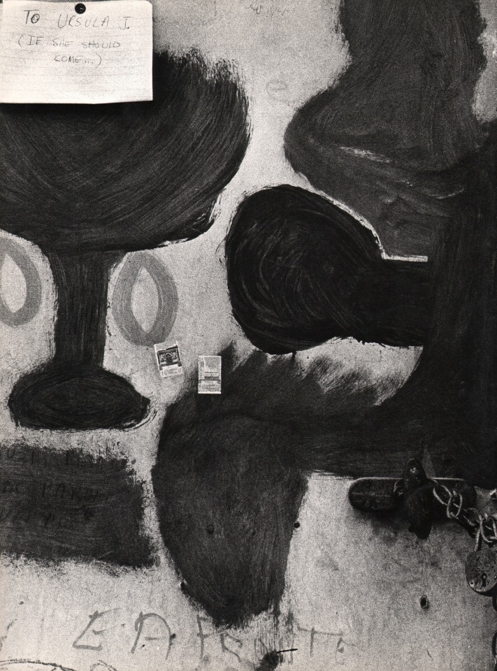 Giuseppe Goffis, Messaggio Per Ursula (Bussana Vecchia), ​1961. Detail of an abstractly painted wall with a note tacked in the upper left of the composition that reads &quot;To Ursula J. (If she should come...)&quot;