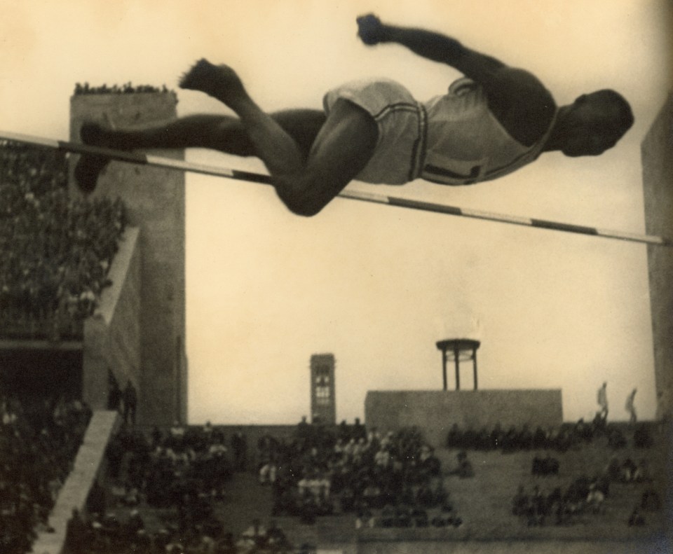 8. Leni Riefenstahl (German, 1902-2003), 8 - Allbritton- USA (Styles of the best high-jumpers), 1936, Vintage Gelatin Silver Print, 9&rdquo; x 11&rdquo;