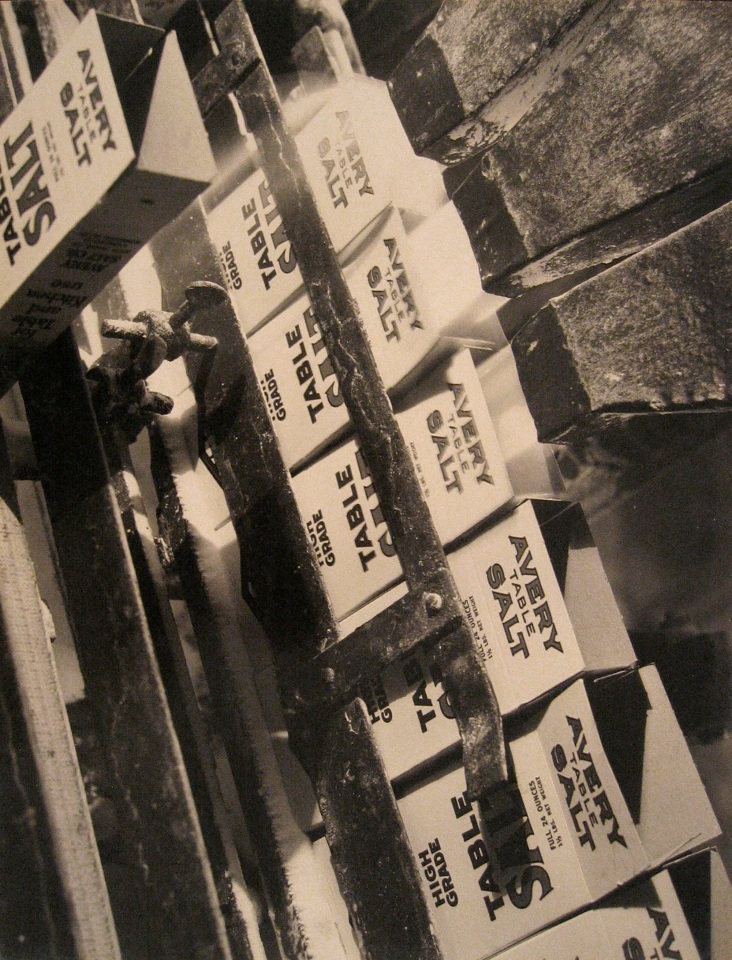 Harold Haliday Costain, Filling Cartons, Island Salt Co. Brand, Avery Island, Louisiana, 1934. A machine fills &quot;Avery Table Salt&quot; boxes with salt.