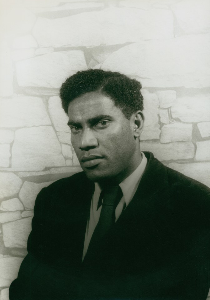 24. Carl Van Vechten, George Lamming, 1955. Bust-length portrait with subject at 45 degrees towards the left of the frame, looking intensely to the camera.