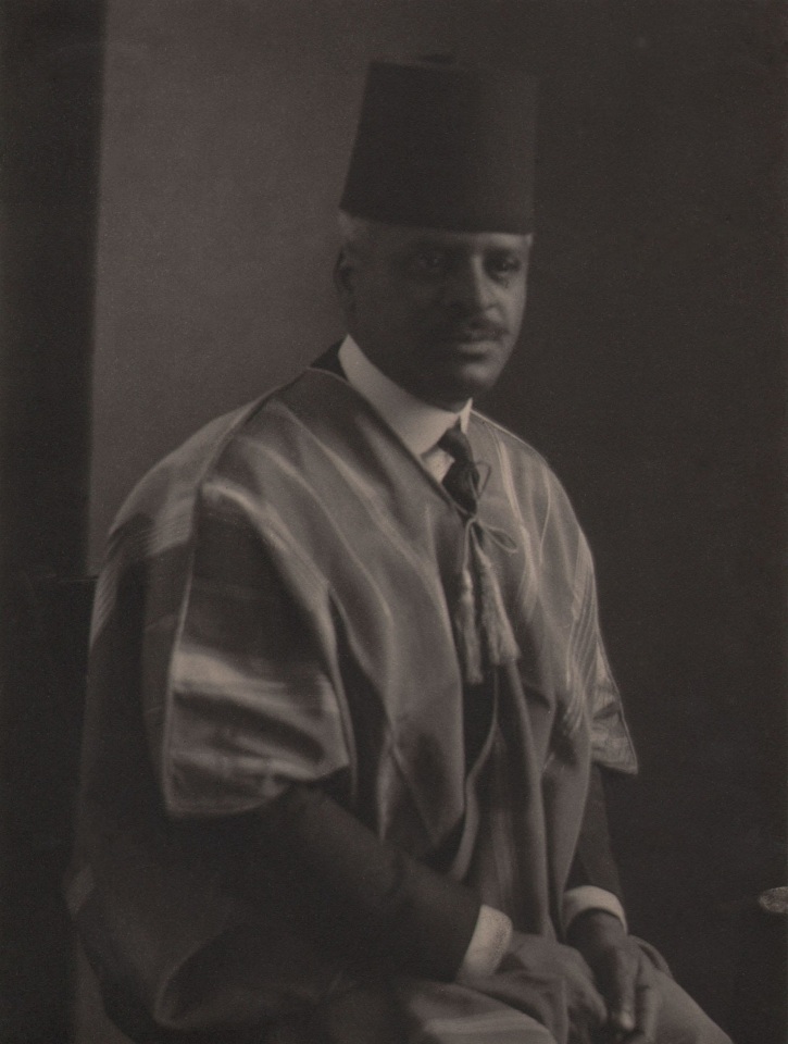 Doris Ulmann, Untitled (Religious man), ​1928&ndash;1934. Seated man in hat and shawl with hands in lap.