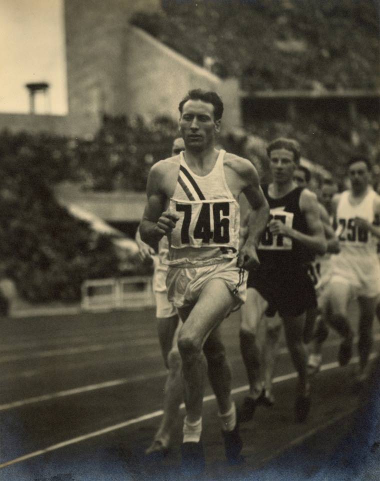 4. Leni Riefenstahl (German, 1902-2003), 4 - Cunningham still leading in the 1500m race over Lovelock (The world&rsquo;s record race - Cunningham-USA still in the lead), 1936, Vintage Gelatin Silver Print, 11&rdquo; x 8.75&rdquo;