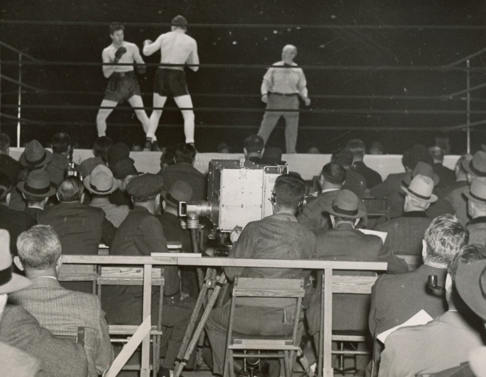 14.&nbsp;Acme Photo, The first time television cameras were ringside at a&nbsp;boxing match to show the Max&nbsp;Baer-Lou Nova fight at Yankee&nbsp;Stadium, 1939, Gelatin Silver Print, 7&rdquo; x 9&rdquo;