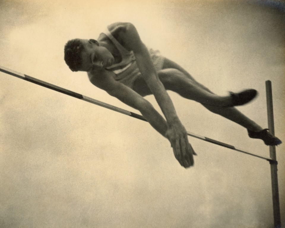 9. Leni Riefenstahl (German, 1902-2003), 9 - Thurber- USA (Styles of the best high-jumpers), 1936, Vintage Gelatin Silver Print, 9&rdquo; x 11&rdquo;