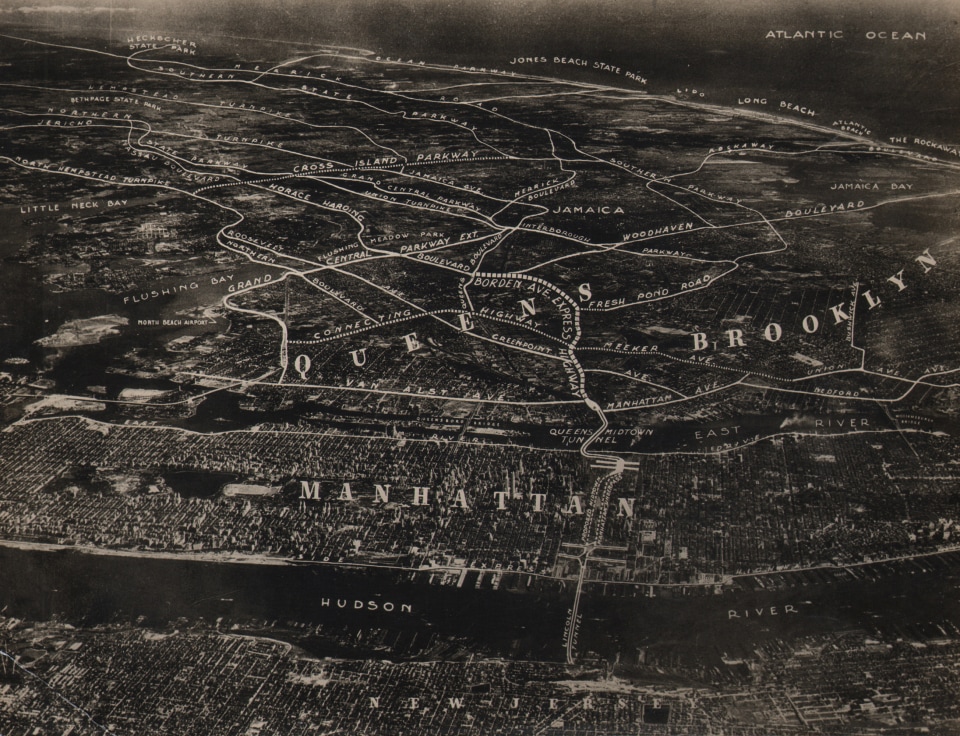 41. International News Photos, An aerial photo of Manhattan..., February 18, 1939. Dark map-like view of the city with neighborhoods, streets, and bodies of water labeled