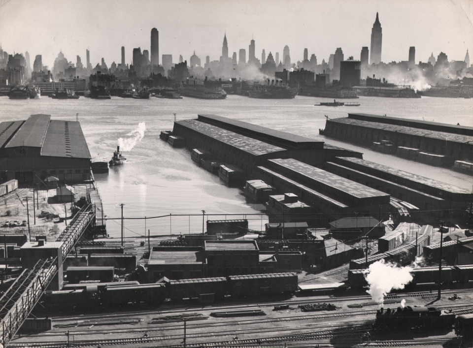 Esther Bubley,&nbsp;Weehawken, New Jersey. View looking east from 50th Street and East Boulevard showing New York Central piers, Hudson River and Midtown Manhattan skyline, 1946