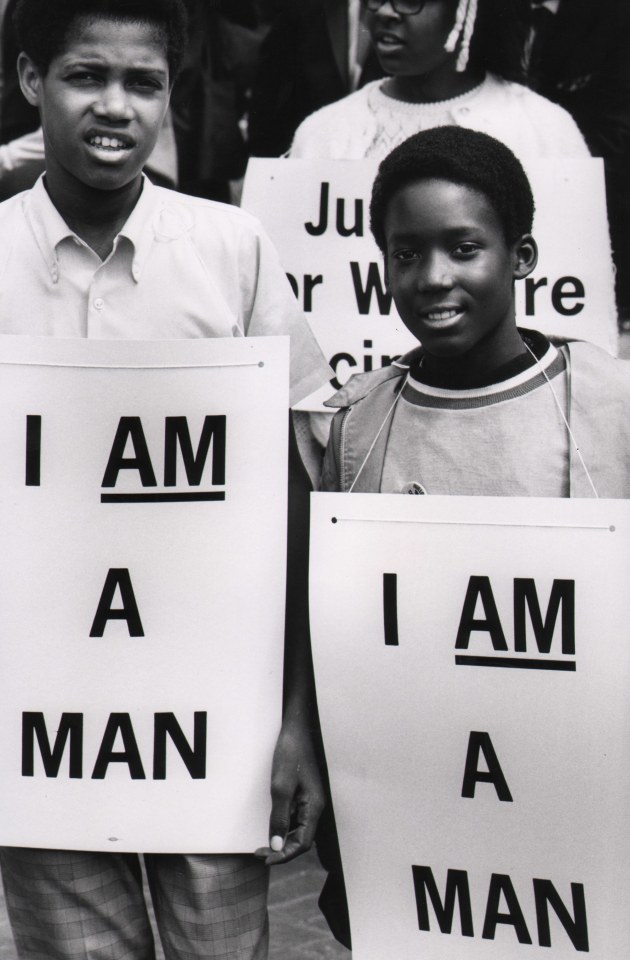 35. Flip Schulke, I Am a Man/Union Justice Now, Martin Luther King Memorial March for Union Justice and to End Racism, Memphis, Tennessee, ​1968. Two young men look to the camera with signs on their chests that read &quot;I am a man&quot;