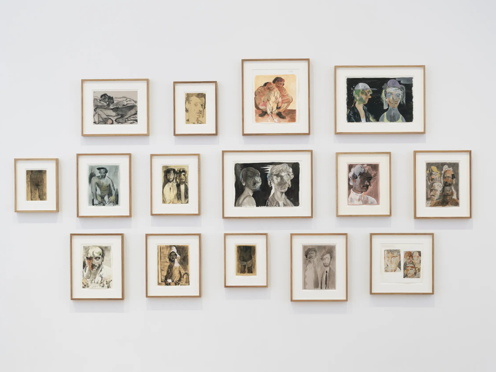 15 framed figure drawings hung on a gallery wall
