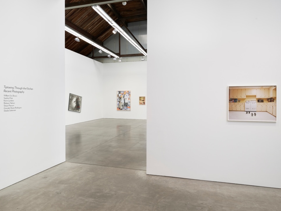 Art gallery view of 3 walls with contemporary photography
