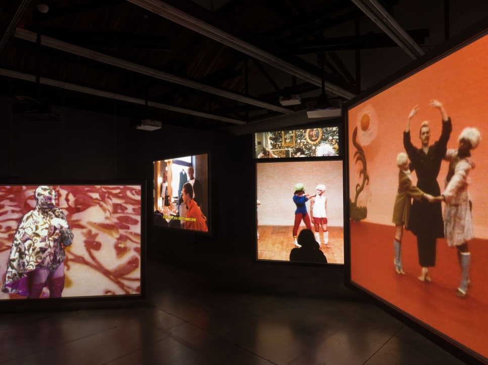 gallery installation of 5 screens with videos of dance projected