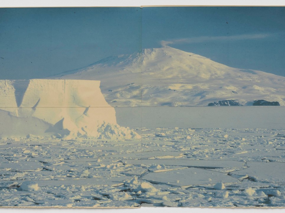 Snow scene with iceberg and mountain, set in a snow covered lake