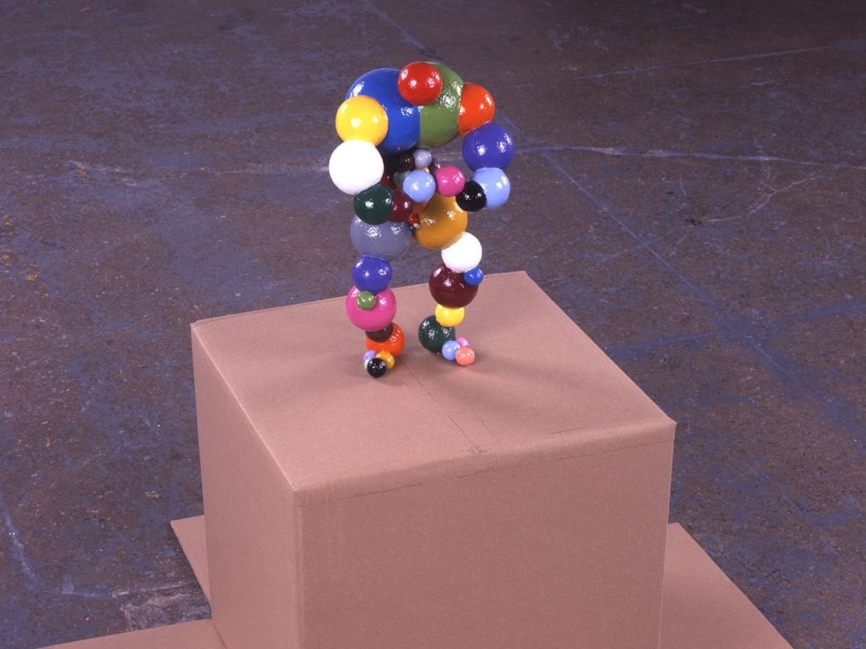 ball sculpture on cardboard box