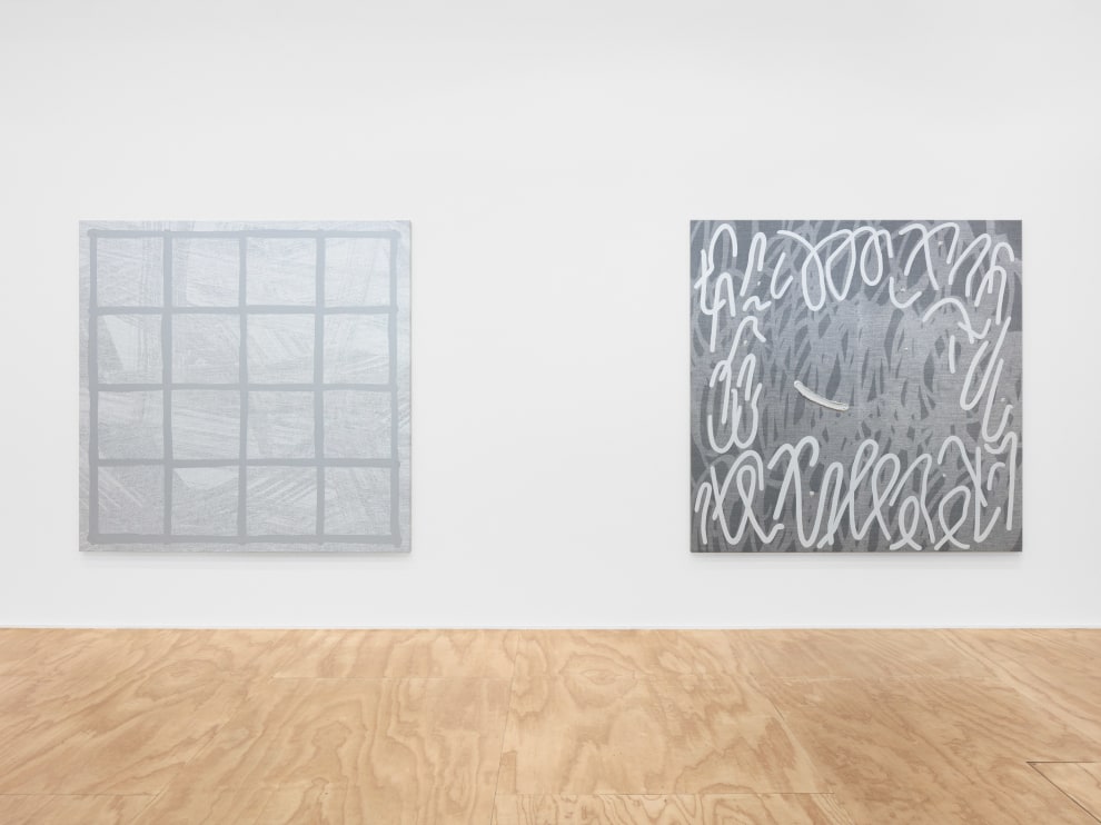 Installation view of two Amy Feldman paintings
