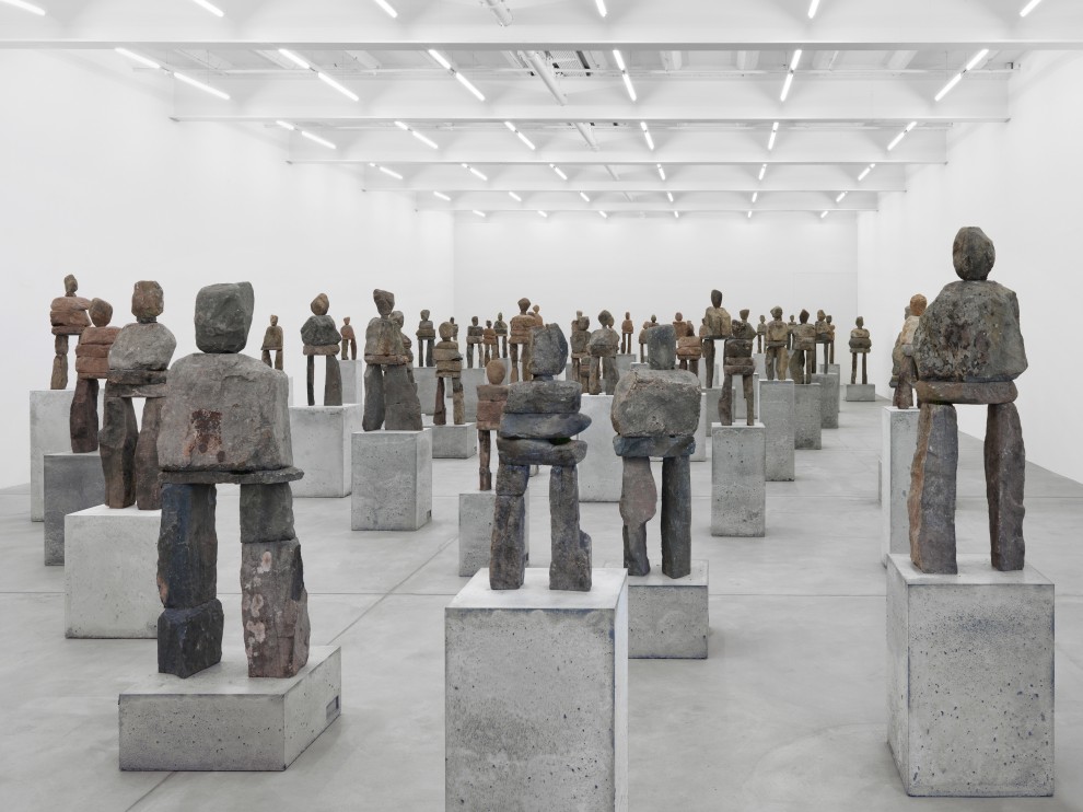 Installation view of Ugo Rondinone stone figure sculptures exhibition