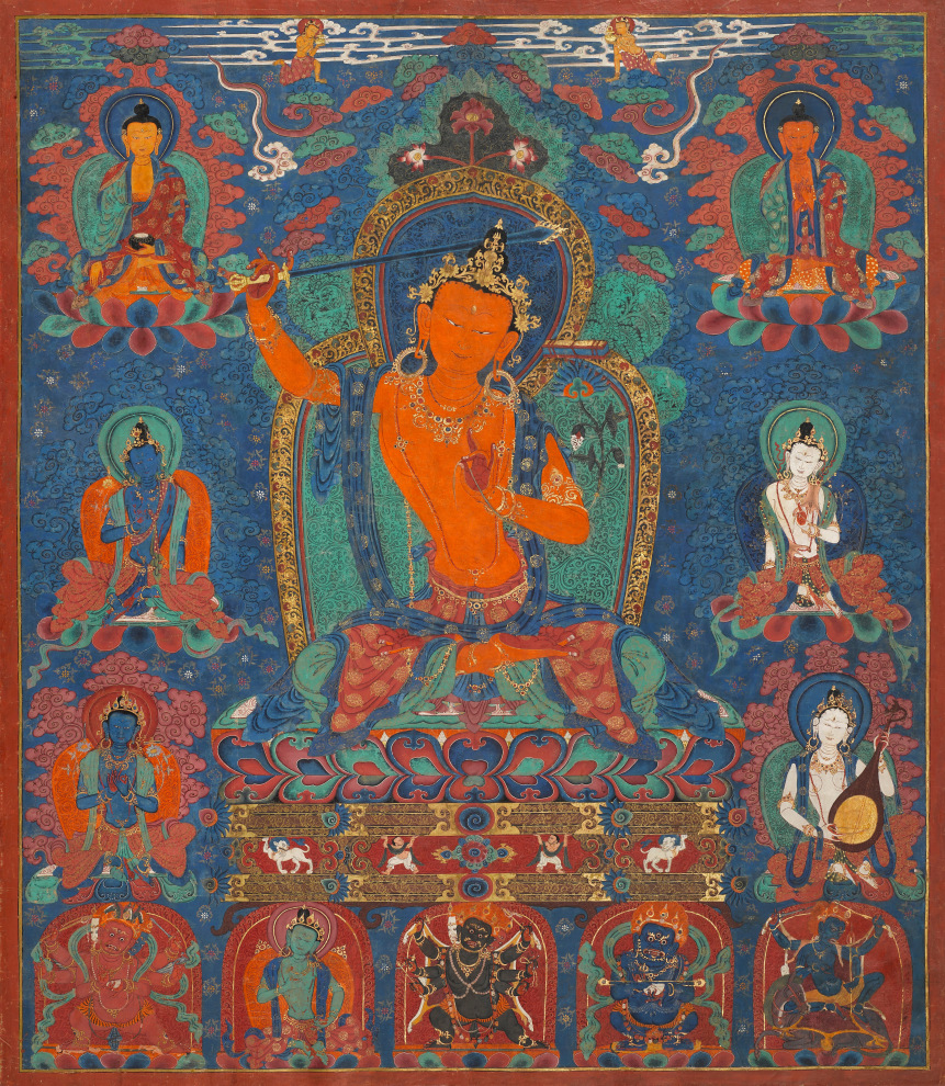 Brightly colored Tibetan thangka of Manjushri with sword raised