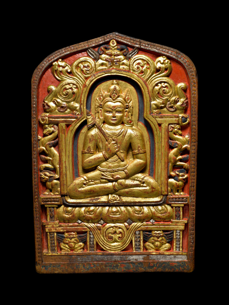 Wood votive plaque of Bon deity Sangpo Bumtrie with gold and red paint