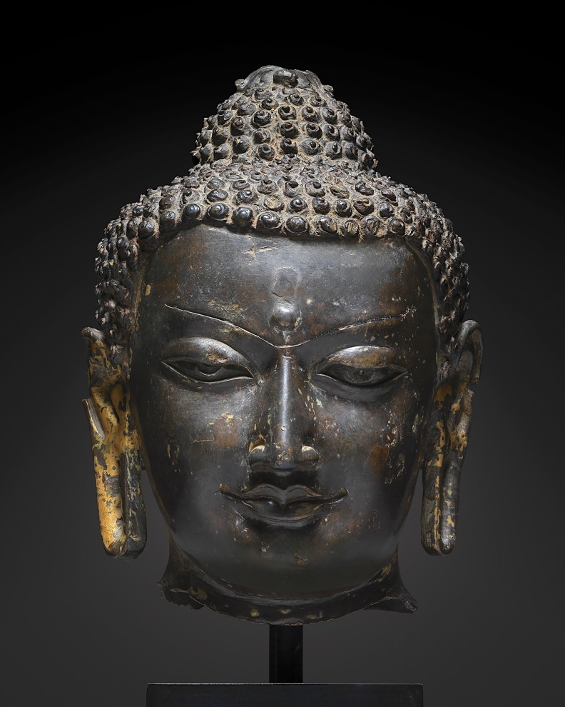 This head would have been part of an unusually large image of Buddha cast during the Pala Dynasty in Eastern India