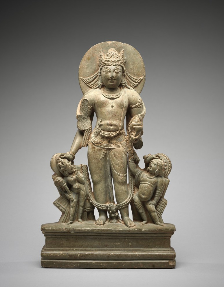 Vishnu is wearing a diaphanous dhoti with horizontal ribbed sash 